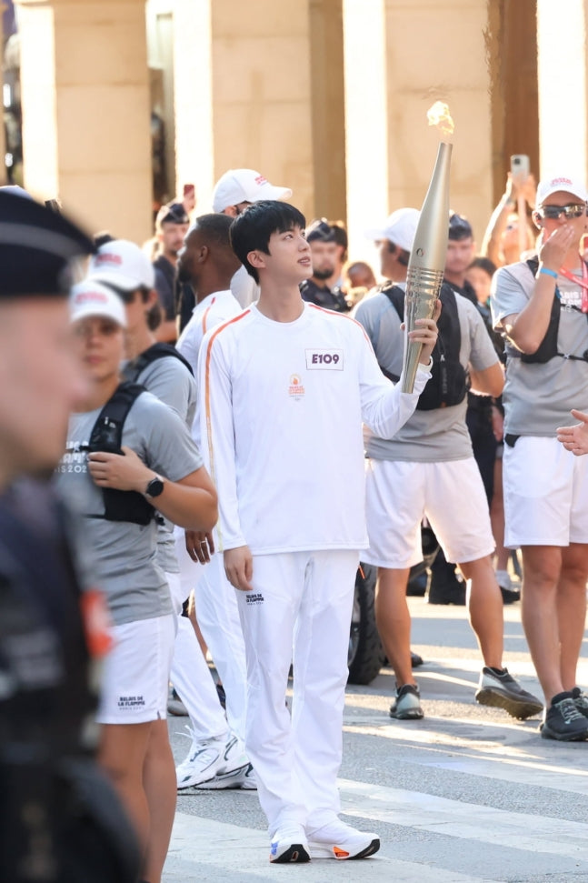 BTS Jin Joins Paris Olympic Torch Relay Amid ARMY Cheers