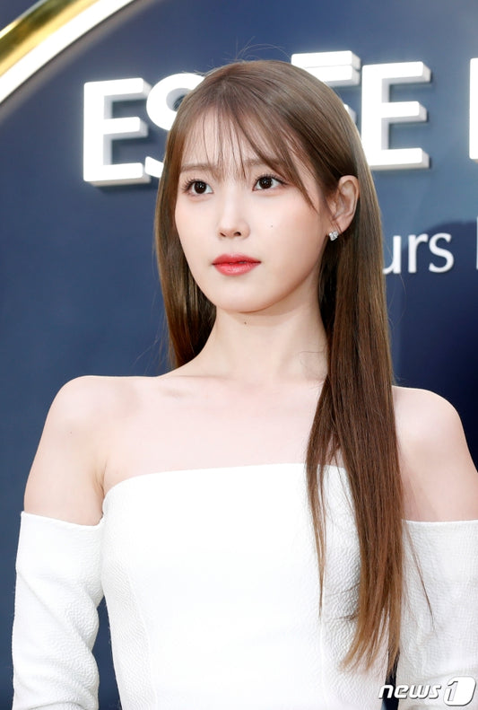 Fans of IU criticize Seoul City for blaming her concert for grass issues at the World Cup Stadium