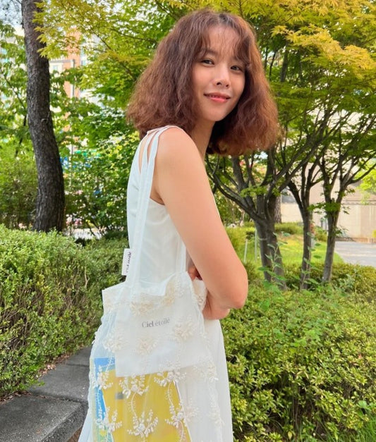 Actress Jo Yoon-hee stuns fans with a fresh curly bob hairstyle amid new beginnings following her split from Lee Dong-gun.